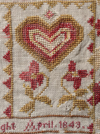Antique heart sampler motif